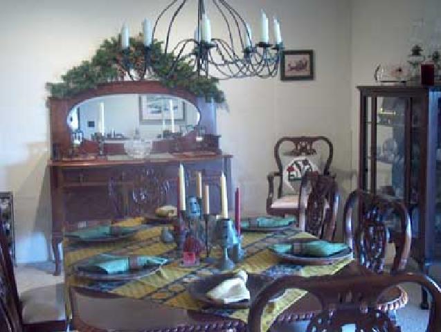 14842 Douglas Road Yakima, WA 98908 - Photo 3 of 9 a view of a dining room with furniture and chandelier
