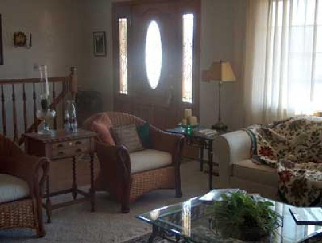 14842 Douglas Road Yakima, WA 98908 - Photo 6 of 9 a living room with furniture and a large window