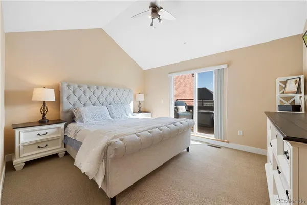 a bed room with a bed and a tv