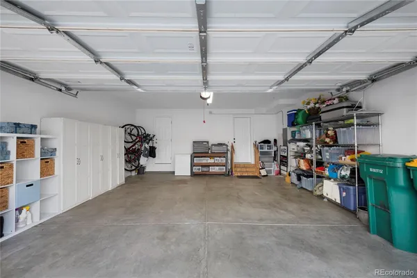 a view of a garage with storage