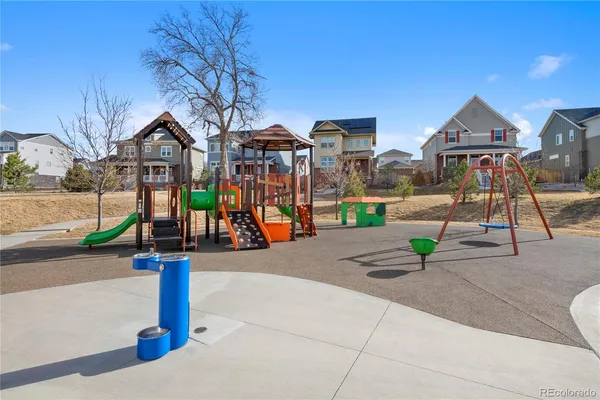 a view of a swimming pool with a lounge chairs