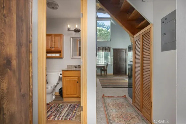 a bedroom with a bed and a table