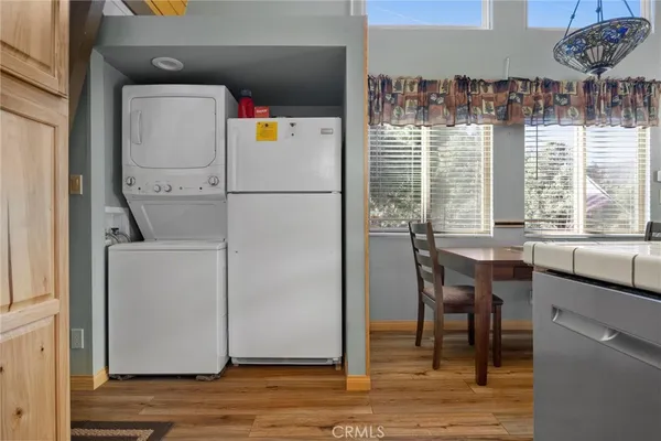 a view of a dining room with furniture and window