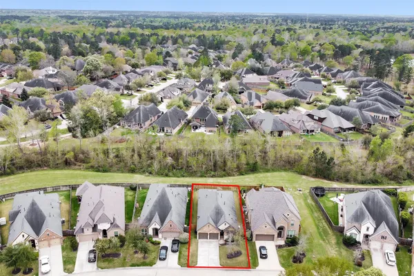 an aerial view of a city with lots of residential buildings