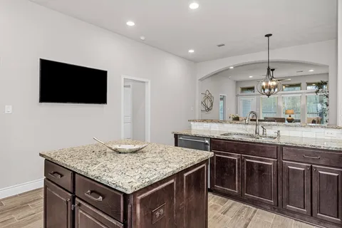 a bathroom with a bathtub and a sink