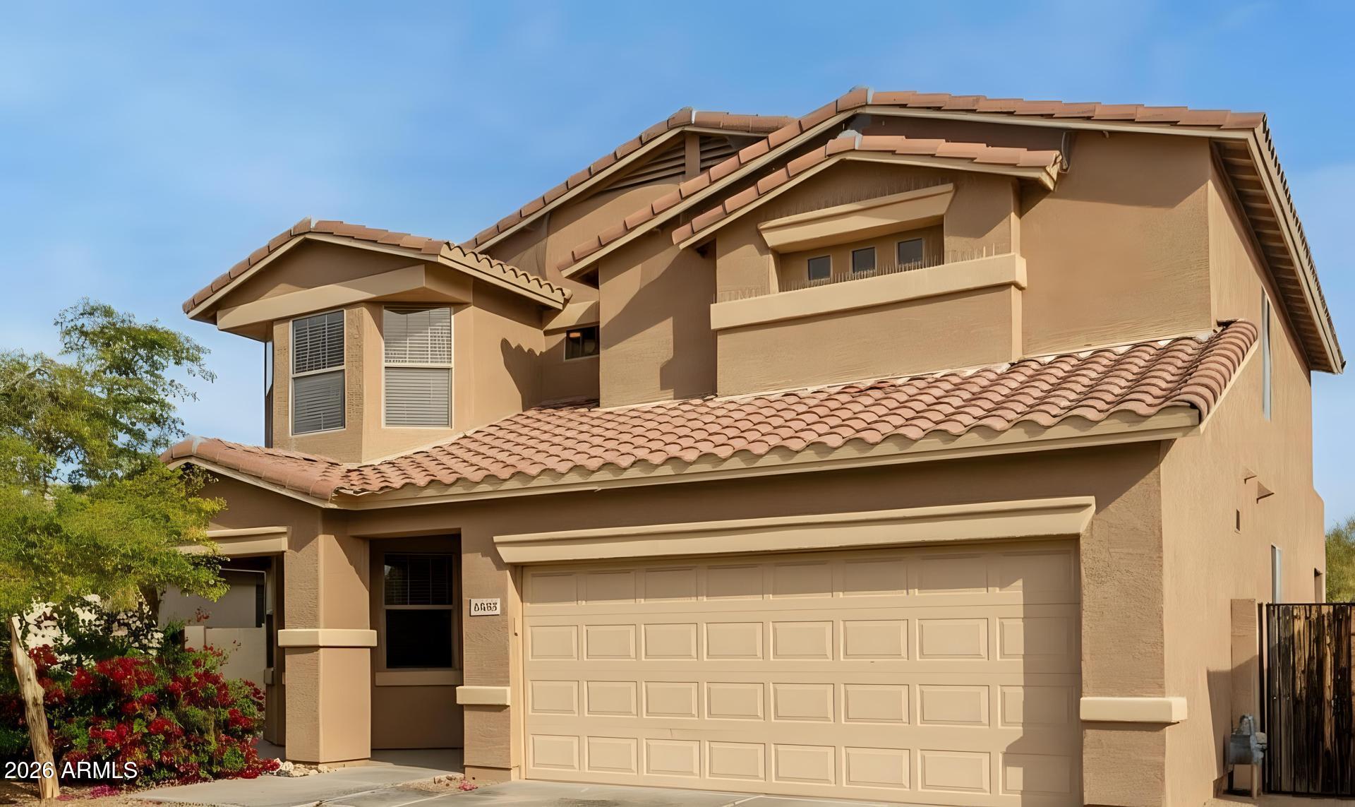 6435 South Beckham Way Laveen, AZ 85339 - Photo 2 of 14 a front view of a house