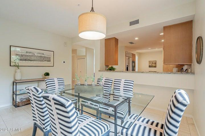 7700 East Gainey Ranch Road, Unit 153 Scottsdale, AZ 85258 - Photo 12 of 24 a living room with furniture