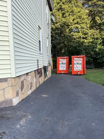a view of street with sign board