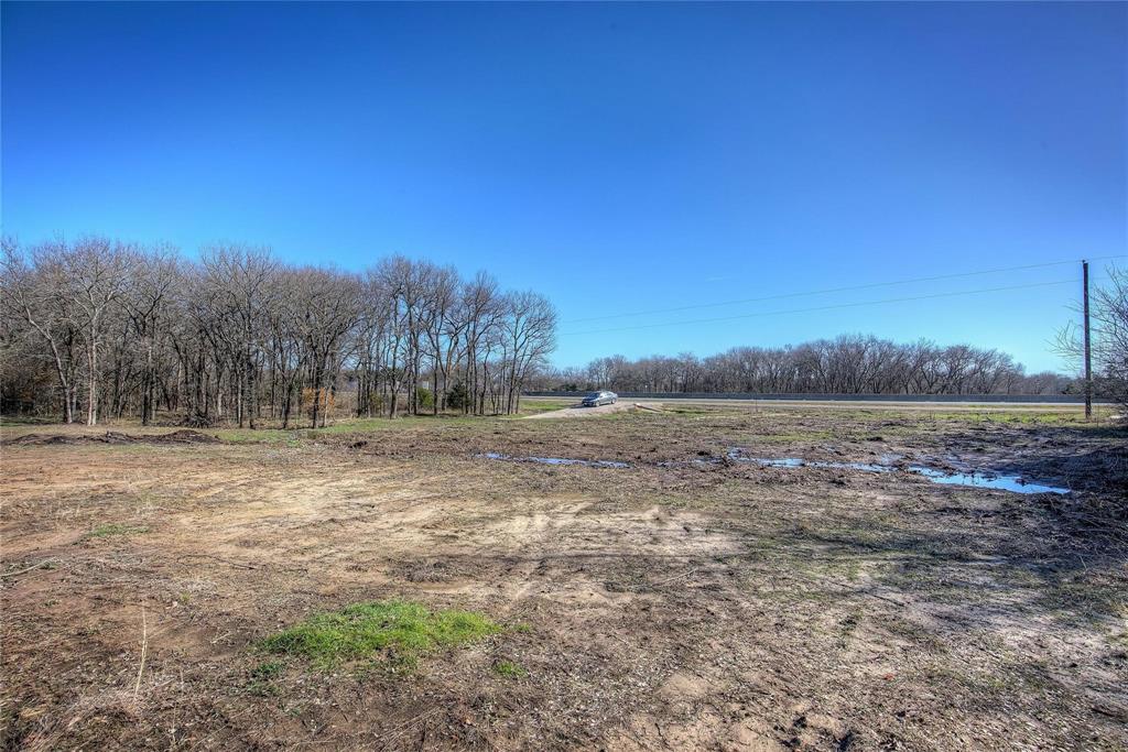 0 West Interstate 30 Campbell, TX 75422 - Photo 24 of 39 a view of dirt field with trees in background
