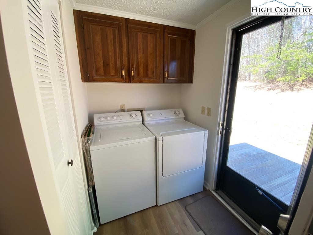 462 Hartsoe Road Warrensville, NC 28693 - Photo 14 of 17 a utility room with dryer and washer