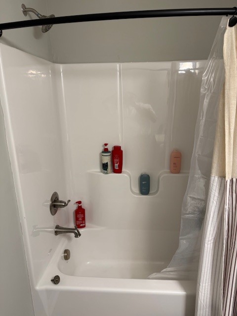 1316 Old Cowan Road Winchester, TN 37398 - Photo 20 of 23 a bathroom with a bathtub and a shower