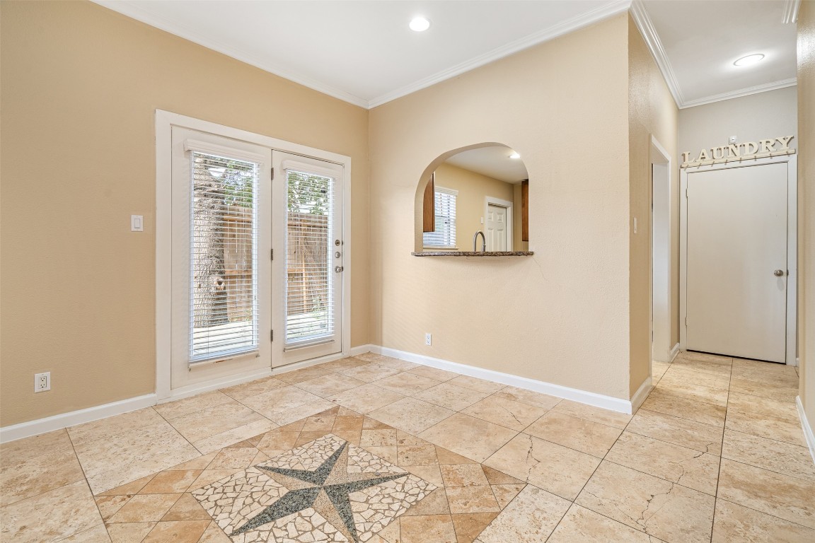 505 Bellevue Place, Unit 3 Austin, TX 78705 - Photo 4 of 23 a view of an empty room with window and bathroom