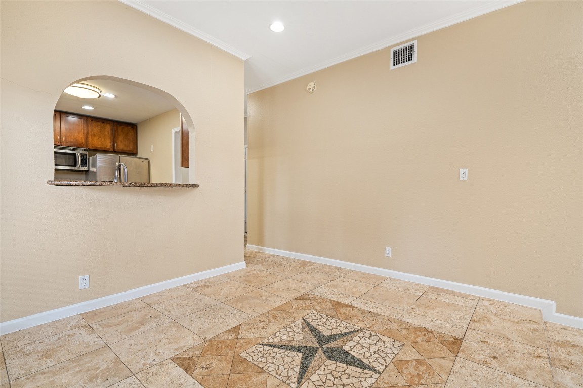 505 Bellevue Place, Unit 3 Austin, TX 78705 - Photo 6 of 23 a view of a small space with wooden floor