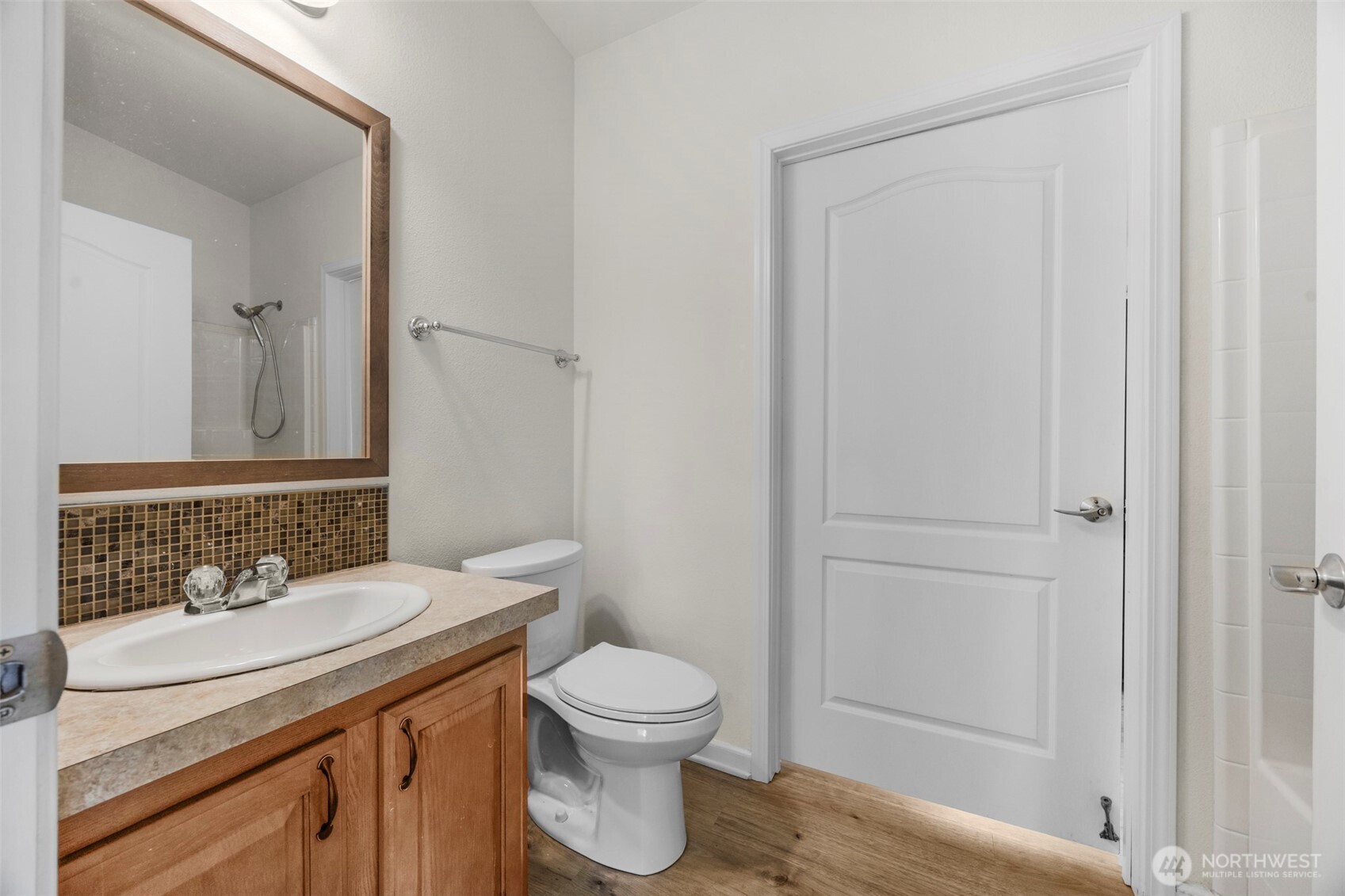3539 Southwest 100th Street Seattle, WA 98146 - Photo 19 of 32 a bathroom with a sink a toilet and shower