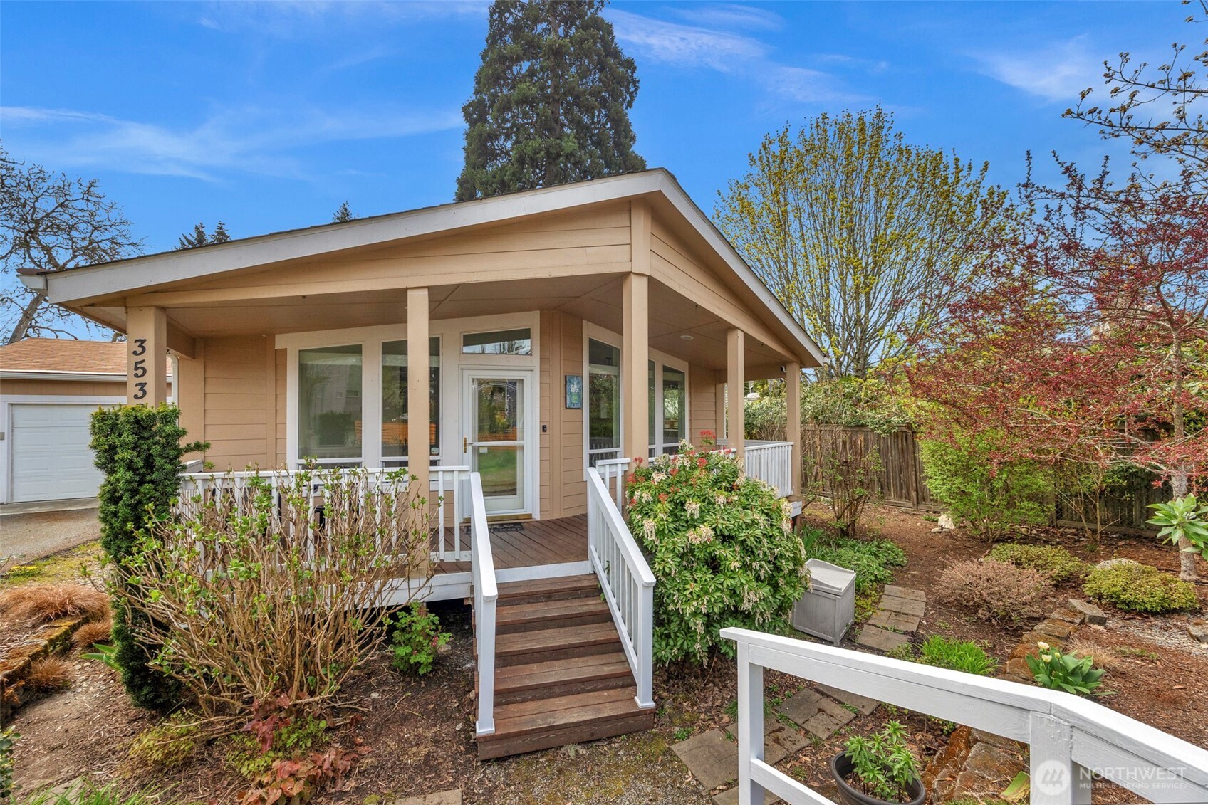 3539 Southwest 100th Street Seattle, WA 98146 - Photo 2 of 32 a front view of a house with a yard