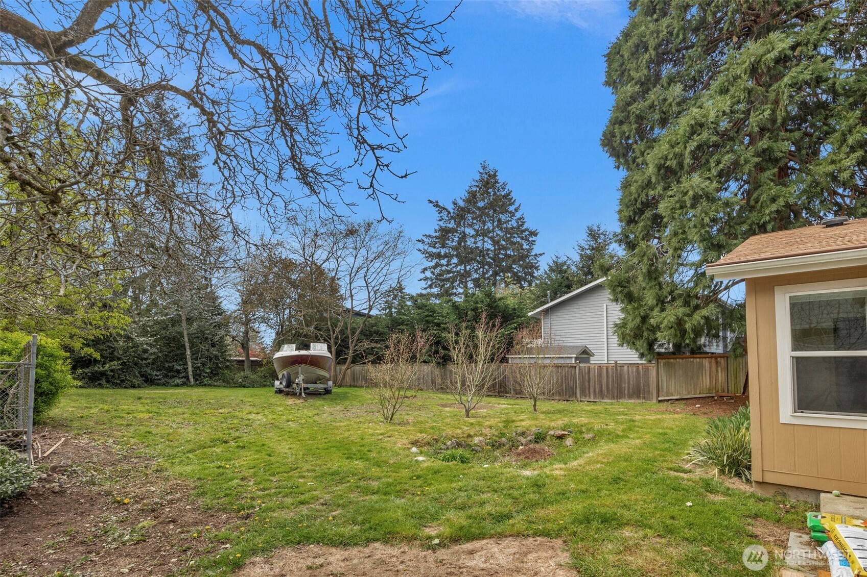 3539 Southwest 100th Street Seattle, WA 98146 - Photo 23 of 32 a front view of a house with garden