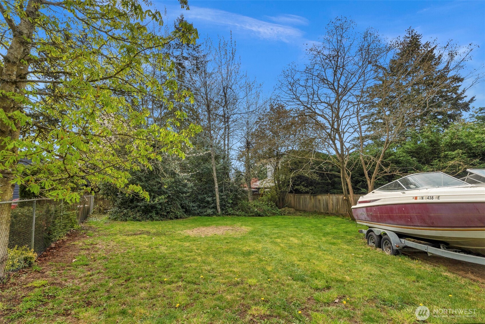 3539 Southwest 100th Street Seattle, WA 98146 - Photo 24 of 32 a garden view with a seating space