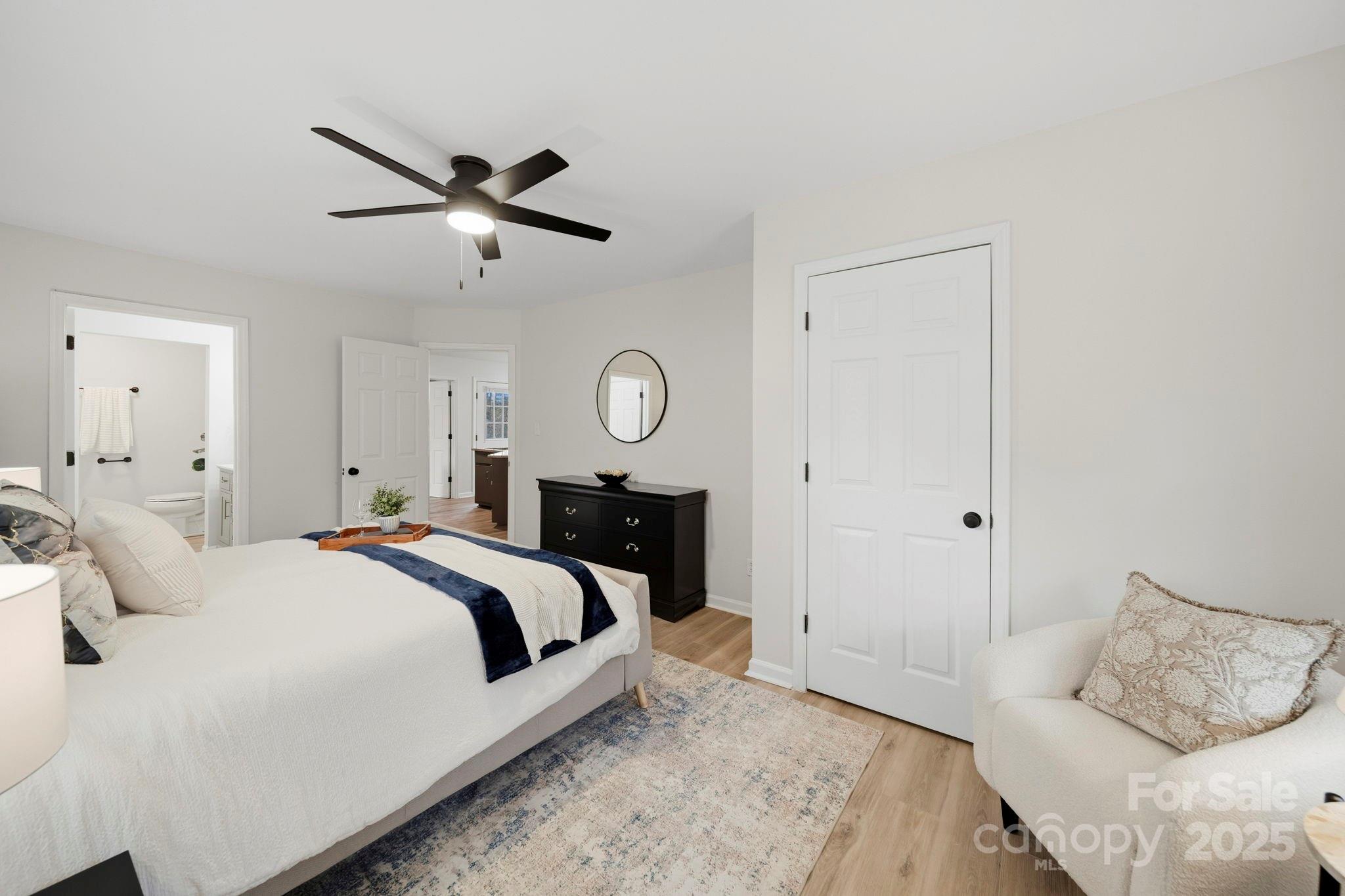 9329 Possum Hollow Road Fort Mill, SC 29707 - Photo 11 of 45 a bedroom with a bed and window