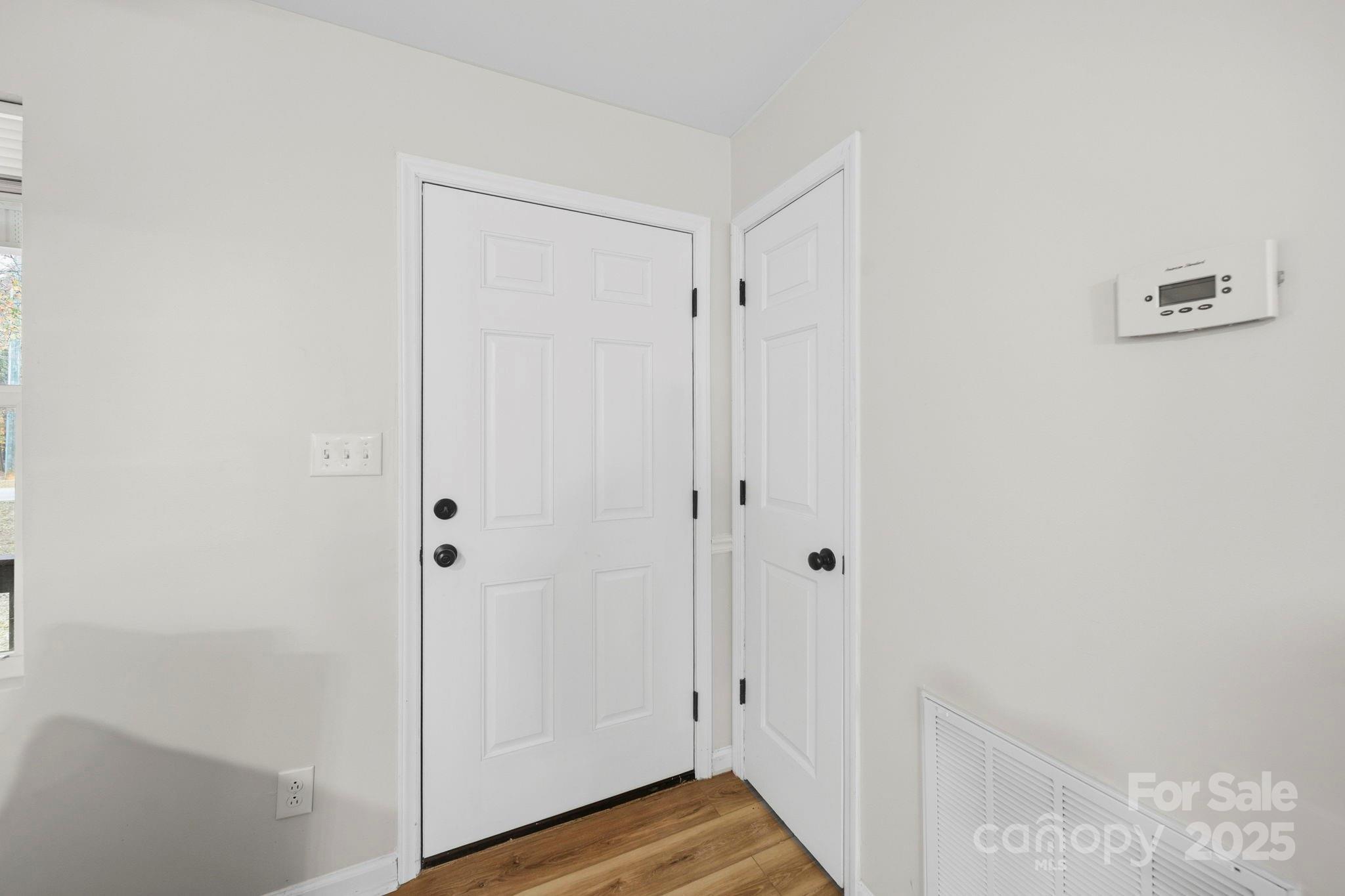 9329 Possum Hollow Road Fort Mill, SC 29707 - Photo 18 of 45 a view of room with hardwood floor