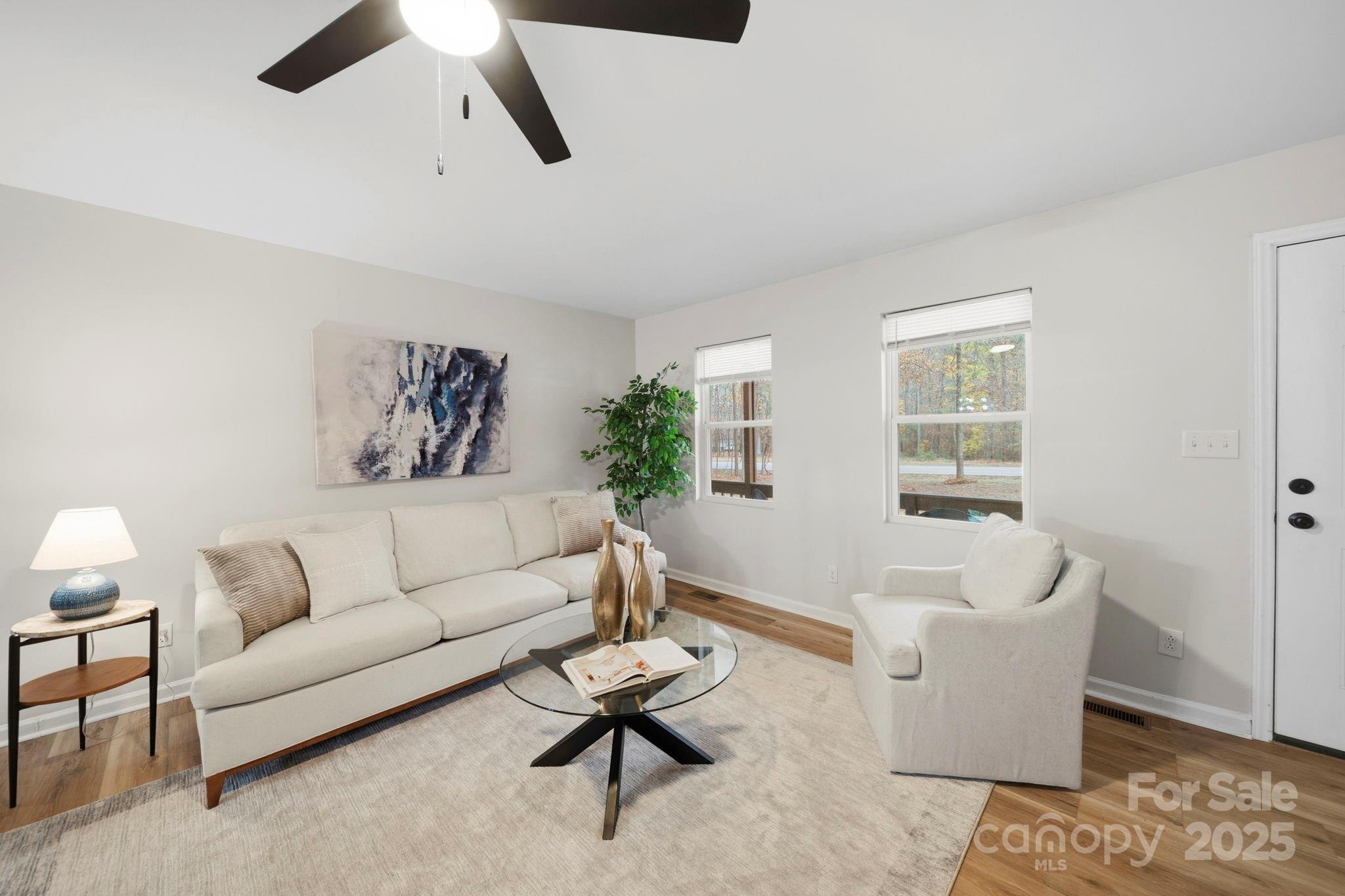 9329 Possum Hollow Road Fort Mill, SC 29707 - Photo 3 of 45 a living room with furniture
