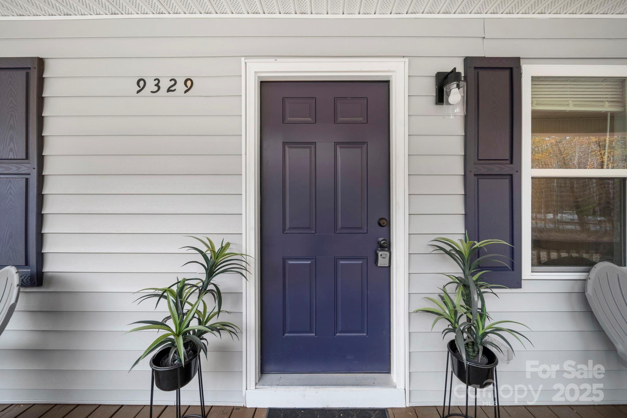 9329 Possum Hollow Road Fort Mill, SC 29707 - Photo 34 of 45 a glass vase with white flowers