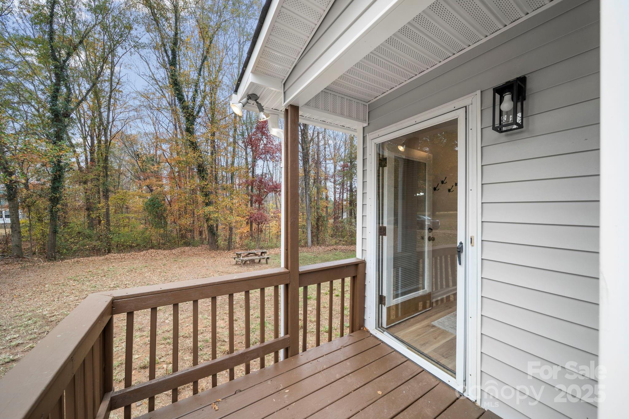 9329 Possum Hollow Road Fort Mill, SC 29707 - Photo 38 of 45 a view of a balcony with wooden floor