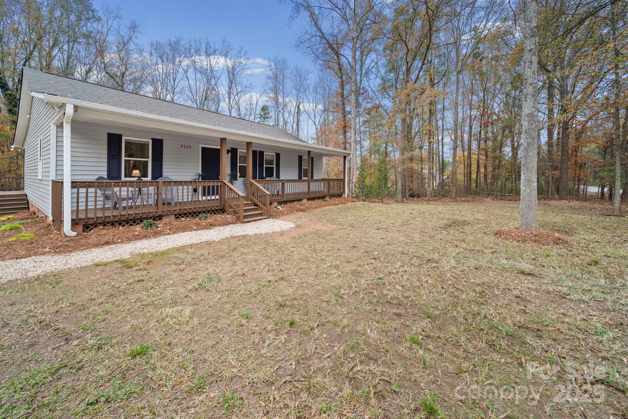 9329 Possum Hollow Road Fort Mill, SC 29707 - Photo 44 of 45 a view of a house with backyard and sitting area