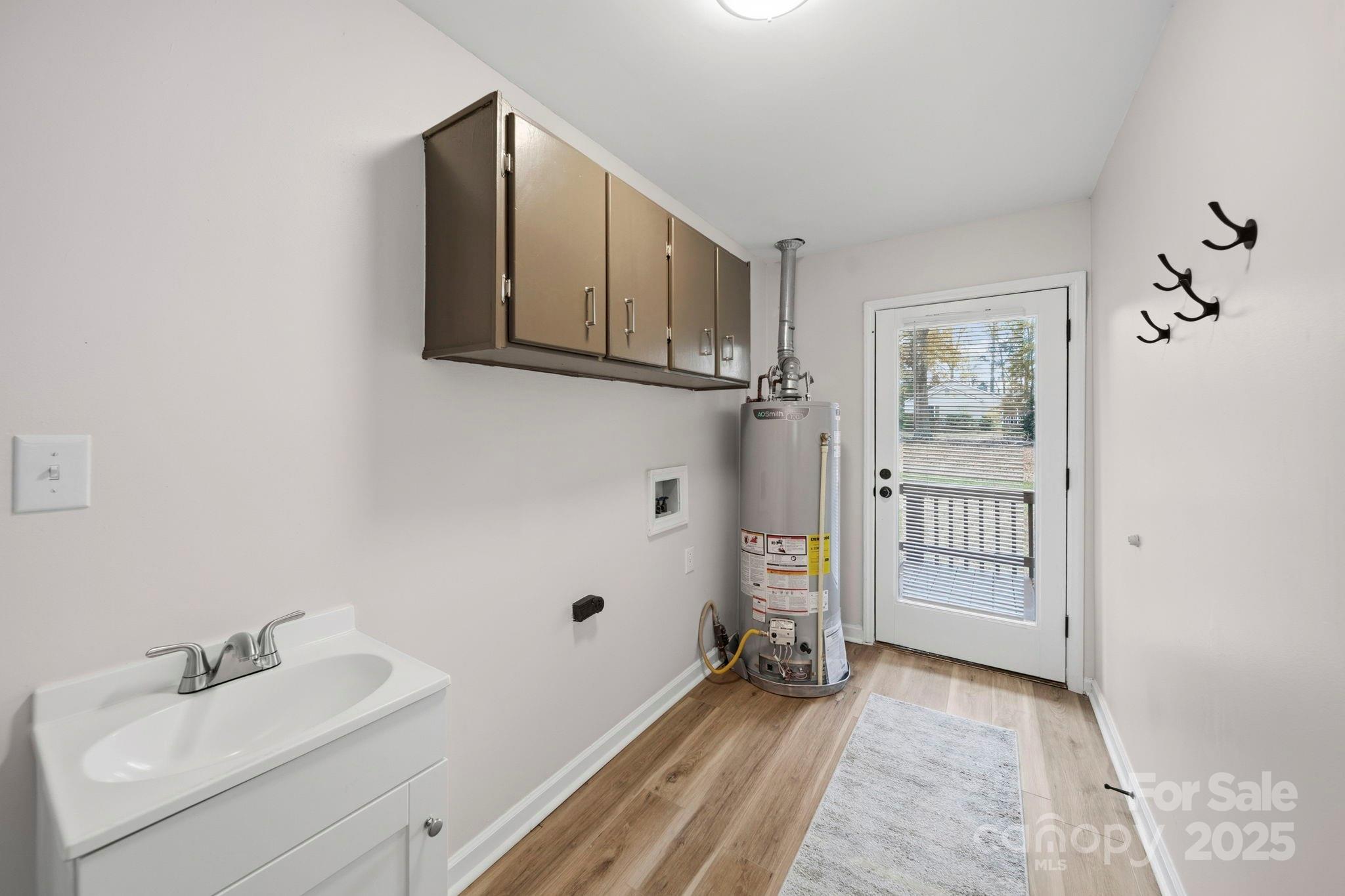 9329 Possum Hollow Road Fort Mill, SC 29707 - Photo 8 of 45 a bathroom with a sink and mirror