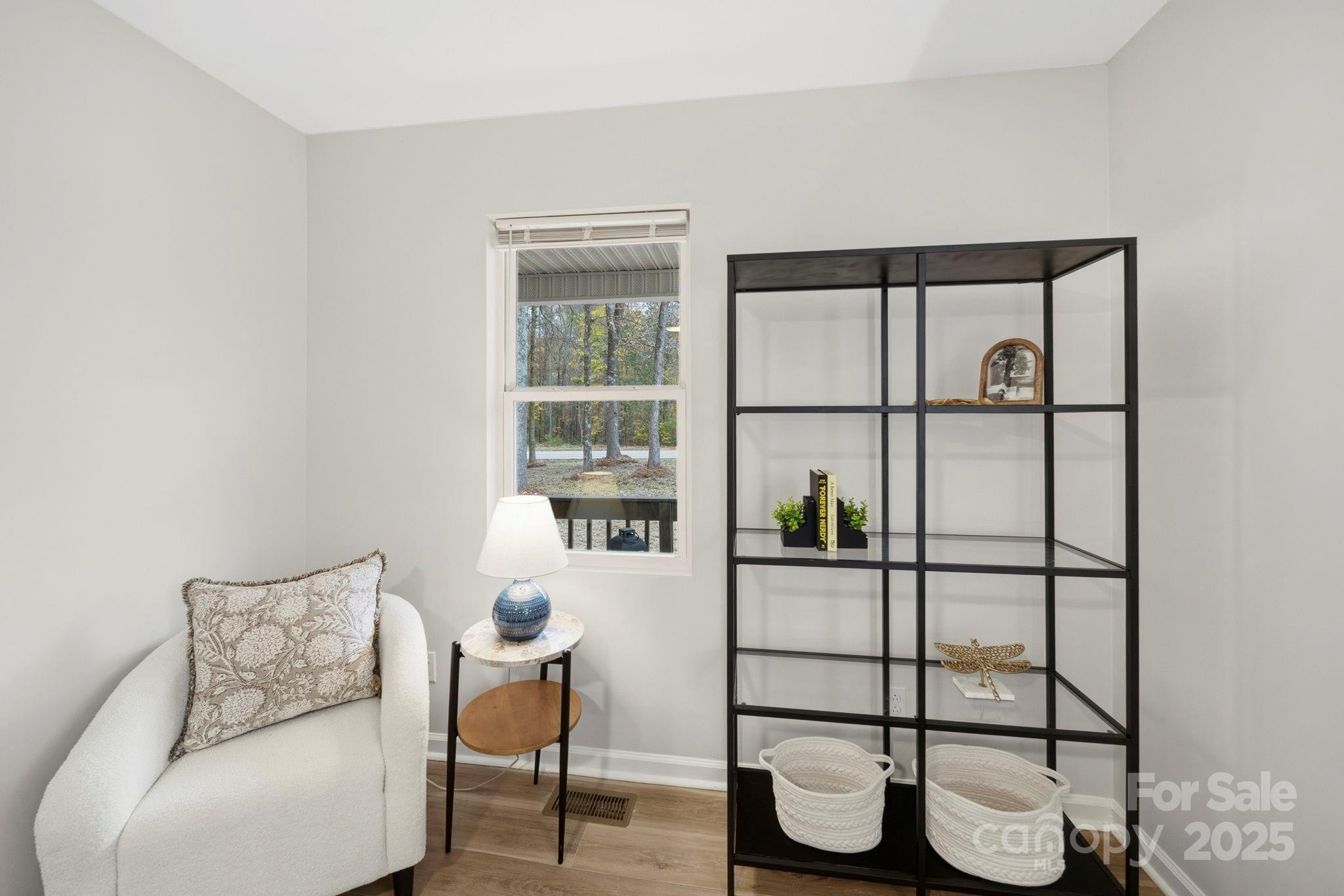 9329 Possum Hollow Road Fort Mill, SC 29707 - Photo 9 of 45 a living room with furniture and white walls