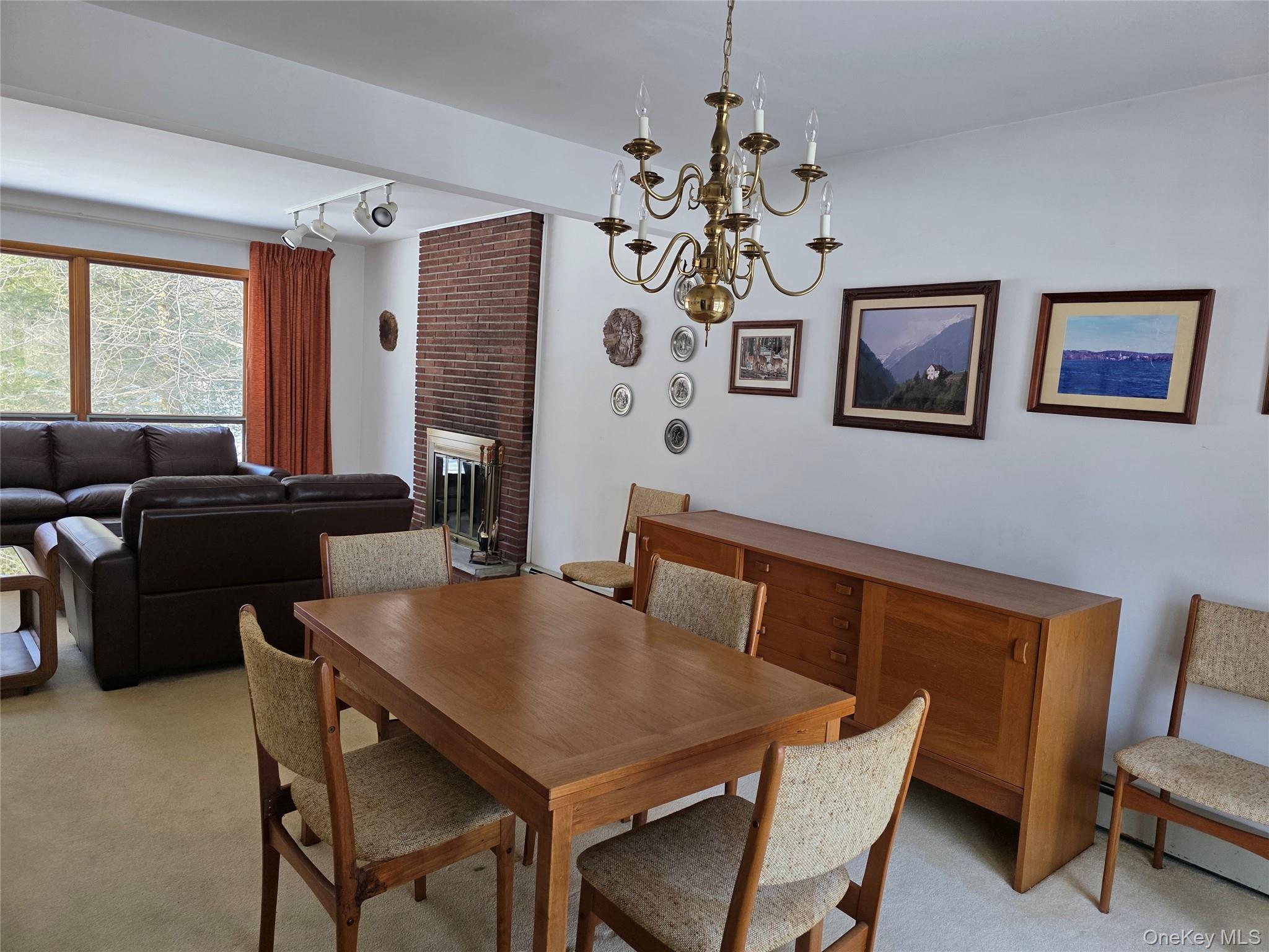 94 Whangtown Road Carmel, NY 10512 - Photo 2 of 12 a view of a dining room with furniture window and outside view