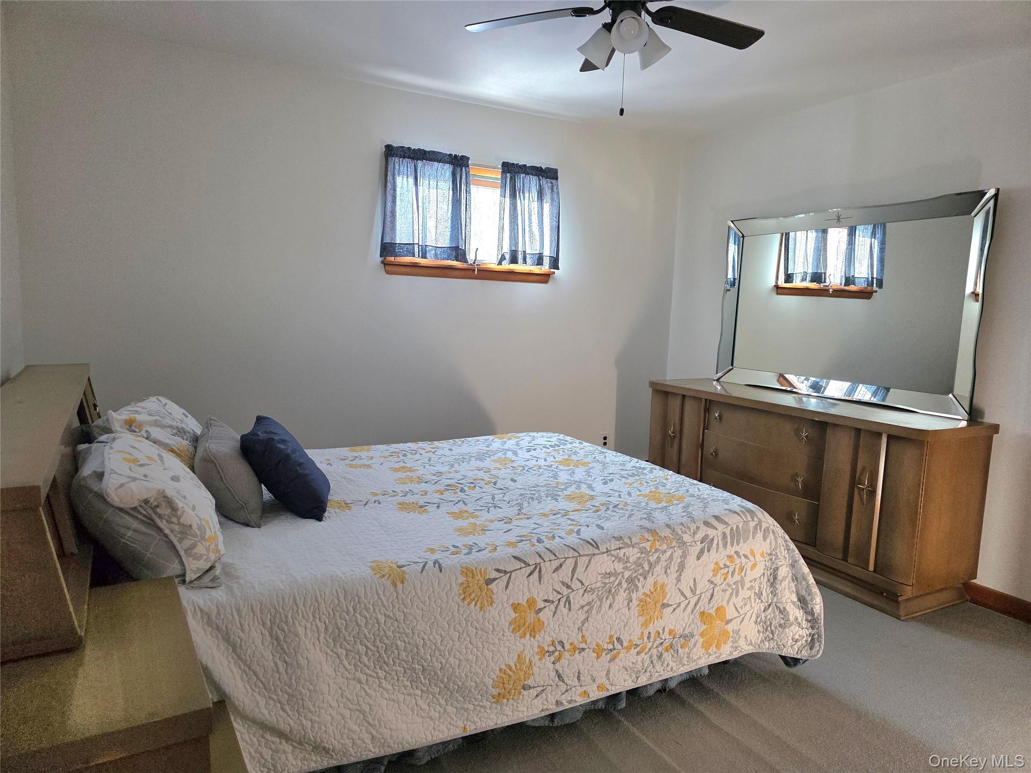 94 Whangtown Road Carmel, NY 10512 - Photo 9 of 12 a bedroom with a bed and a desk