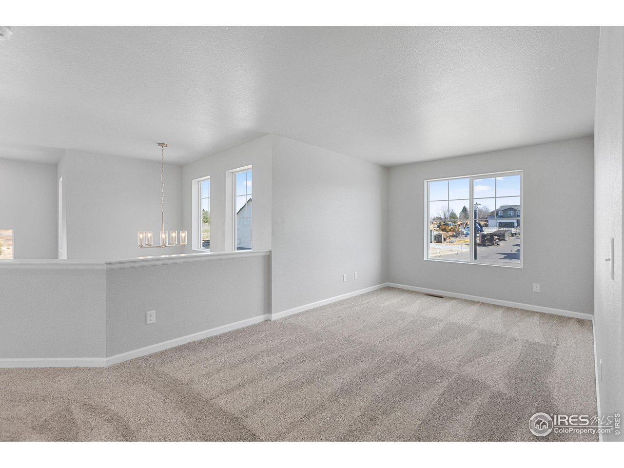 16953 Ballinger Circle Mead, CO 80542 - Photo 11 of 27 a view of an empty room with window