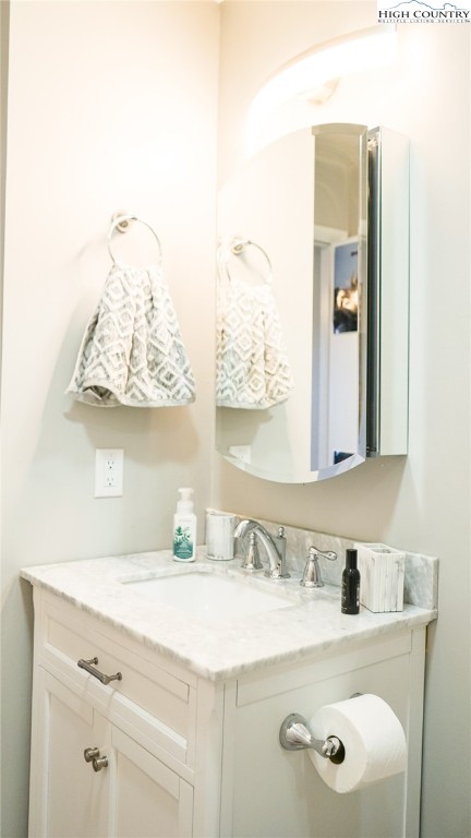 475 Meadowview Drive, Unit B306 Boone, NC 28607 - Photo 11 of 14 a bathroom with a sink and a mirror