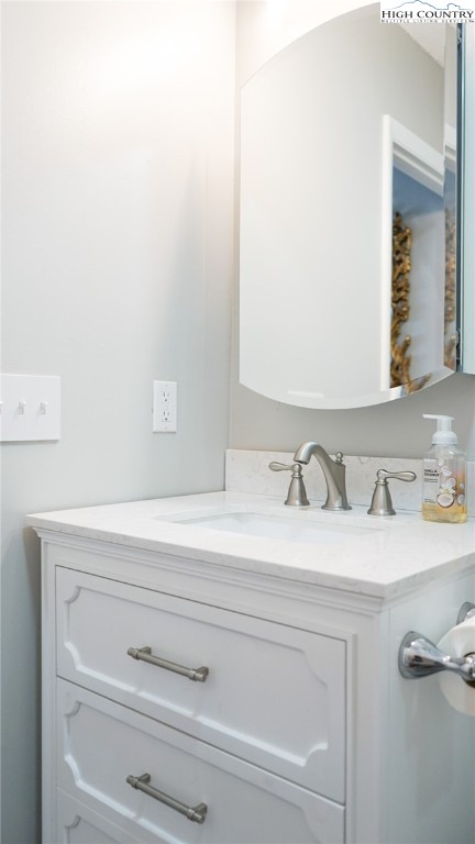 475 Meadowview Drive, Unit B306 Boone, NC 28607 - Photo 9 of 14 a bathroom with a sink and a mirror