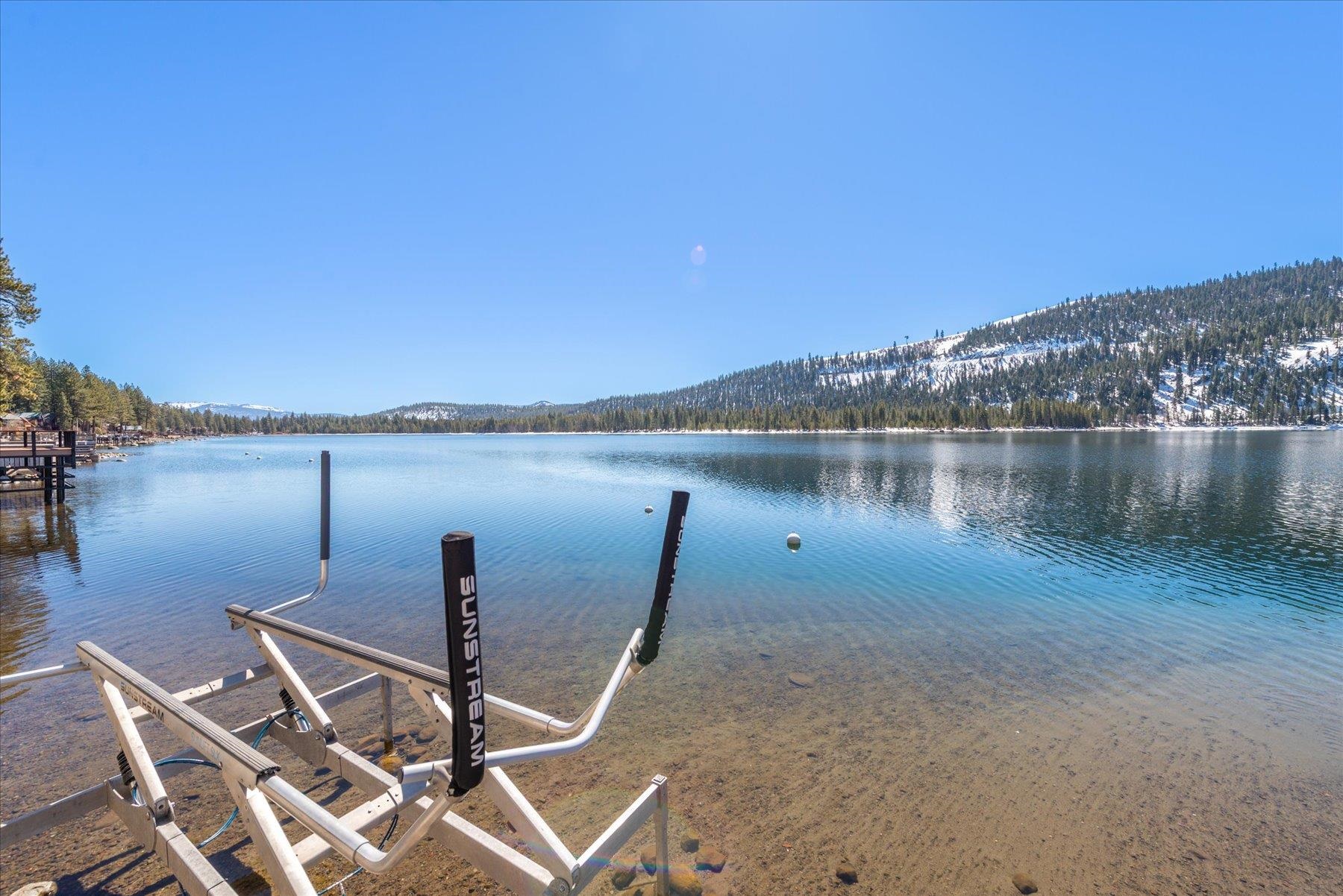 13751 Donner Pass Road Truckee, CA 96161 - Photo 12 of 28 a view of a lake with couches in the patio
