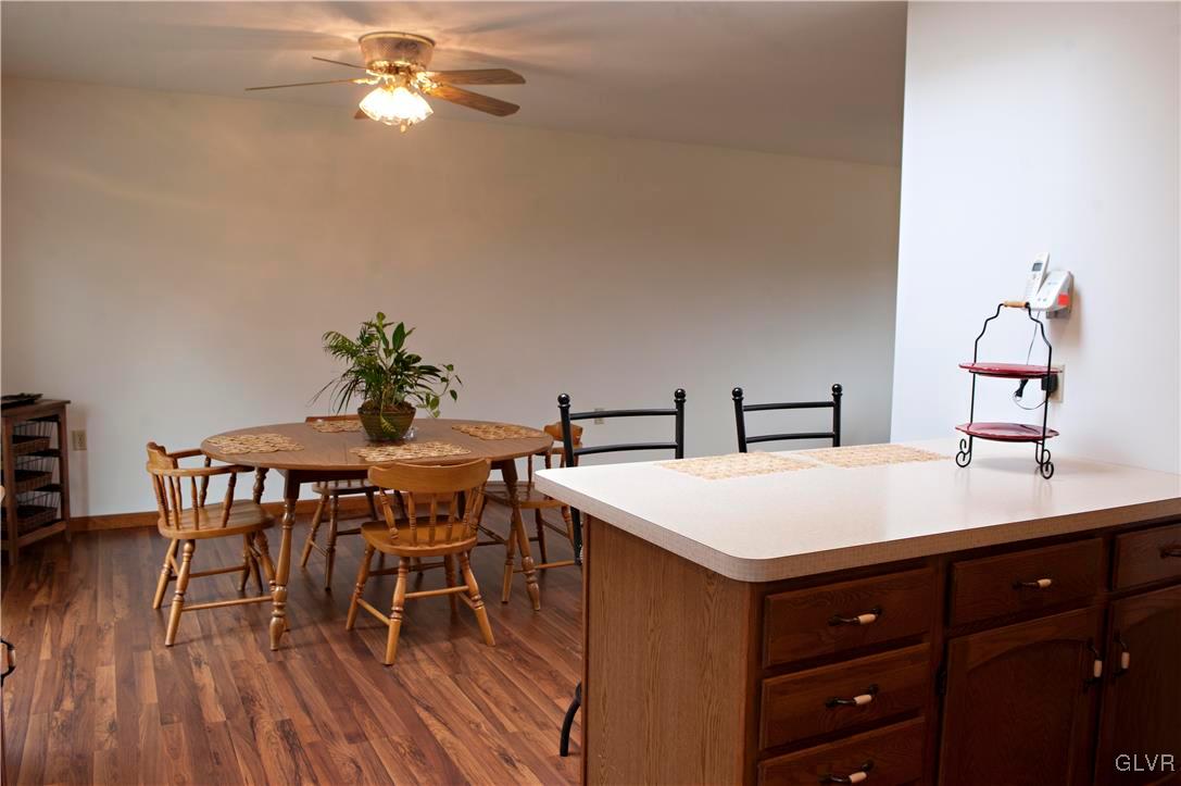 214 Ruth Road Bath, PA 18014 - Photo 11 of 25 a view of a dining room with furniture and wooden floor