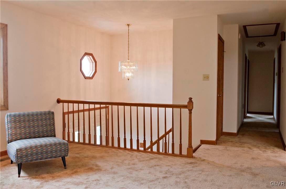 214 Ruth Road Bath, PA 18014 - Photo 6 of 25 a view of hallway with furniture and a rug