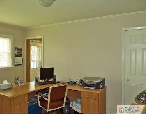 125 Normandy Road Colonia, NJ 07067 - Photo 7 of 10 a view of a workspace with furniture