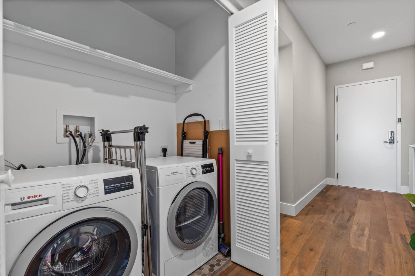 400 Mariners Island Boulevard, Unit 202 San Mateo, CA 94404 - Photo 13 of 31 a view of livingroom with washer and dryer