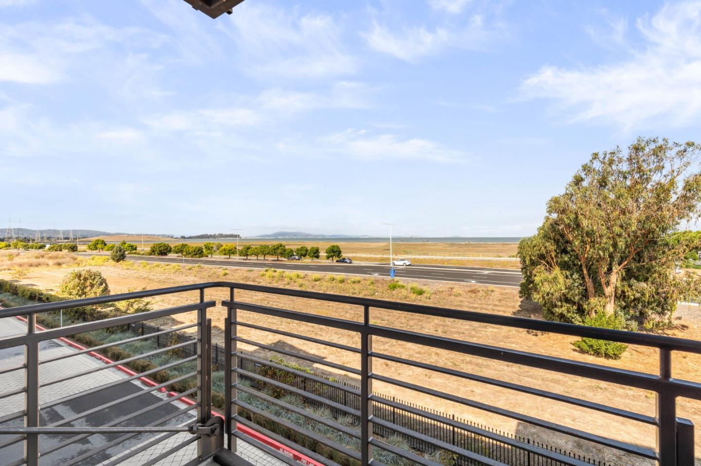 400 Mariners Island Boulevard, Unit 202 San Mateo, CA 94404 - Photo 15 of 31 a view of an ocean from a balcony