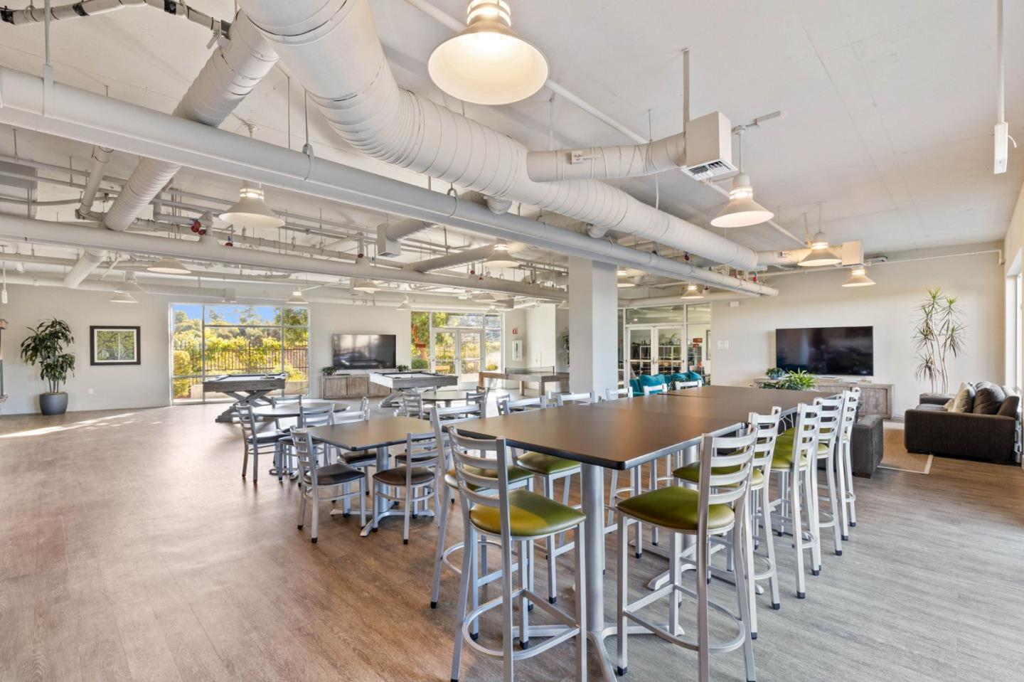 400 Mariners Island Boulevard, Unit 202 San Mateo, CA 94404 - Photo 20 of 31 a view of a dining room with furniture window and wooden floor