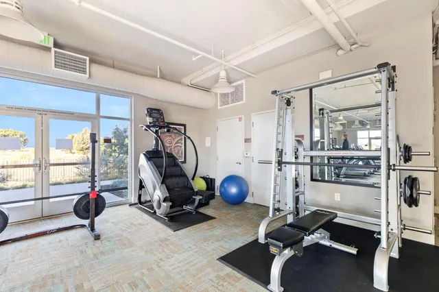 a view of a room with gym equipment