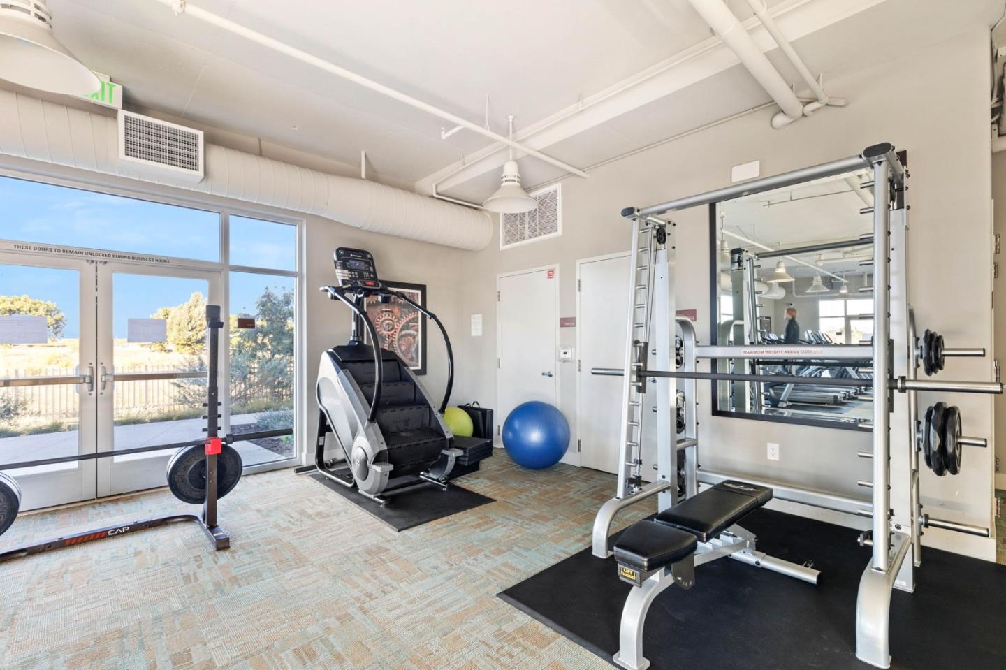 400 Mariners Island Boulevard, Unit 202 San Mateo, CA 94404 - Photo 24 of 31 a view of a room with gym equipment