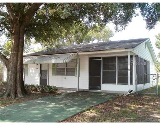 4313 Cardoon Drive New Port Richey, FL 34653 - Photo 1 of 1 front view of a house with a yard