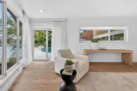 a bathroom with a shower a toilet and sink