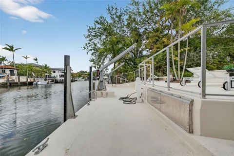 an aerial view of houses with yard