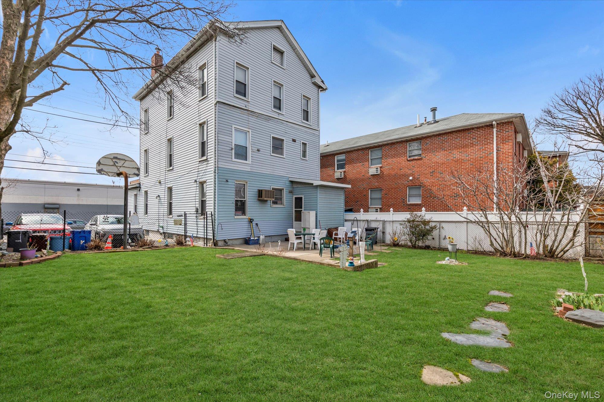117-11 14th Road Queens, NY 11356 - Photo 21 of 23 View from backyard towards the street.