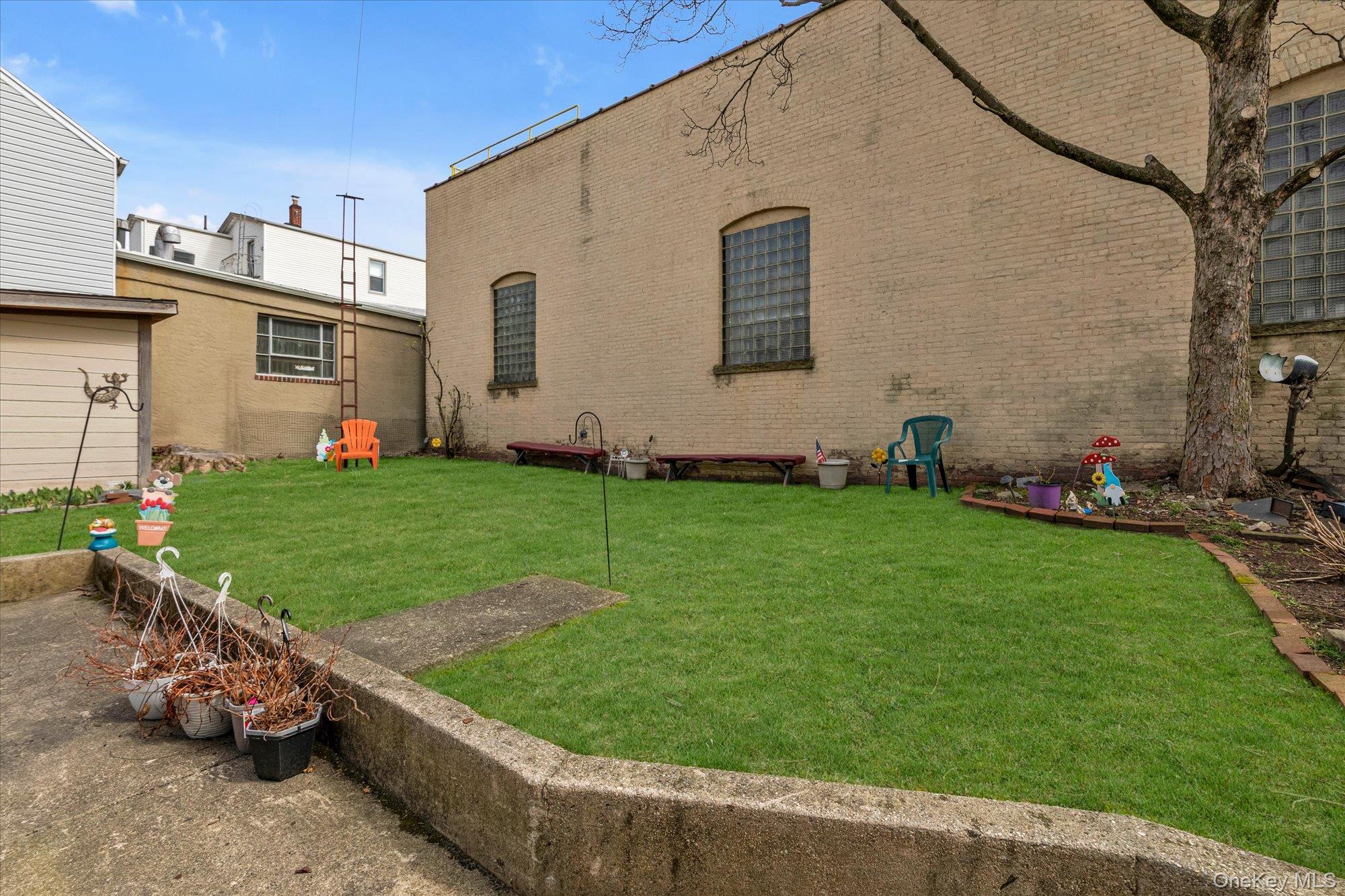 117-11 14th Road Queens, NY 11356 - Photo 22 of 23 Side yard.