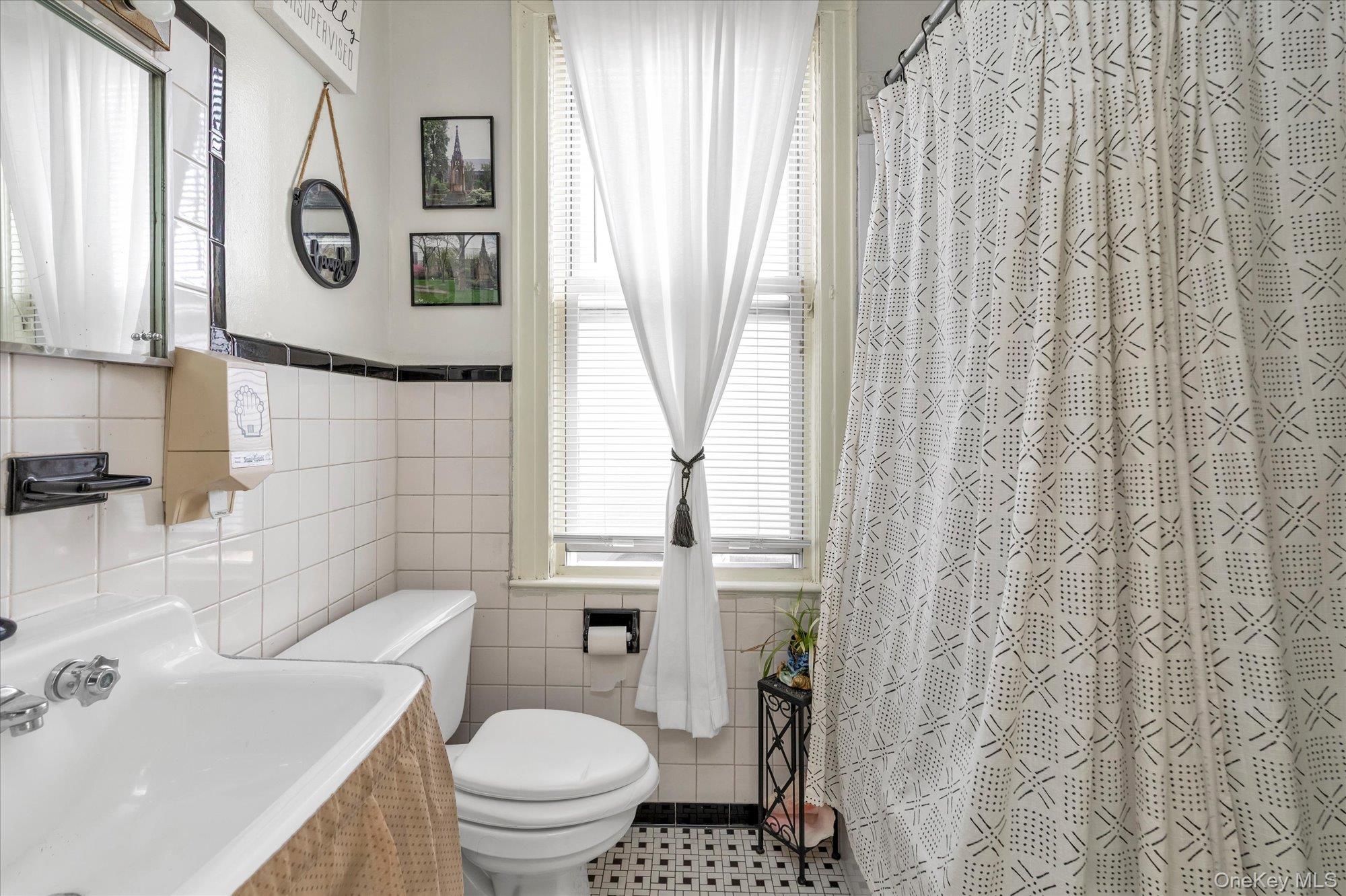 117-11 14th Road Queens, NY 11356 - Photo 8 of 23 First floor bathroom