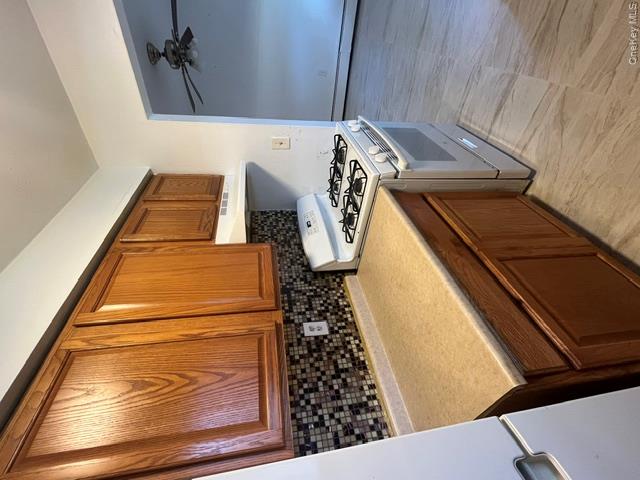 30 Tanager Road, Unit 3001 Monroe, NY 10950 - Photo 12 of 20 a kitchen with a sink and a stove top oven